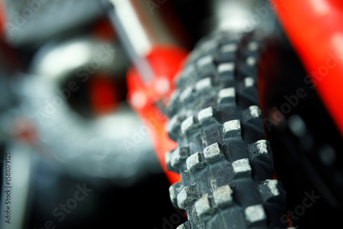 A close up of a tire with a black and white pattern