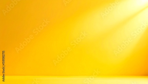 Bright yellow studio backdrop with spotlight