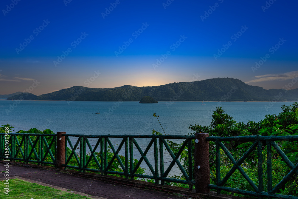 Fototapeta premium Beautiful view from Kao Khad next to Cape Panwa on the island of Phuket Thailand. Views of the turquoise Blue waters of the Andaman Sea and small islands off the coat of Phuket