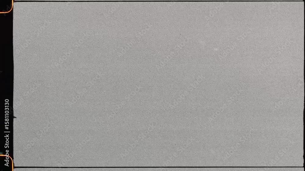 Analog 16 mm Film Overlay with Fine Grain Texture, Sprockets and Dust Marks