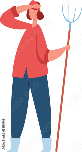 Young female farmer holding a pitchfork and shielding her eyes from the sun with her hand in a rural setting, symbolizing hard work and dedication in agriculture