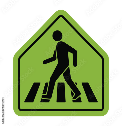 Green pedestrian crossing sign with a black silhouette of a person walking