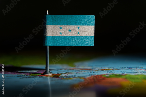  Honduras national flag on Central America political map.