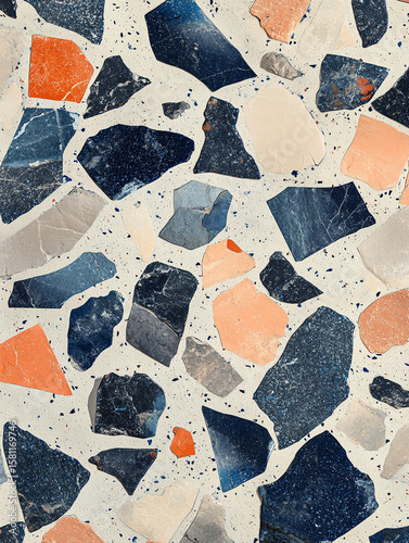 A modern terrazzo design featuring bold chips of cobalt blue and soft peach, scattered across a smooth, off-white base. 