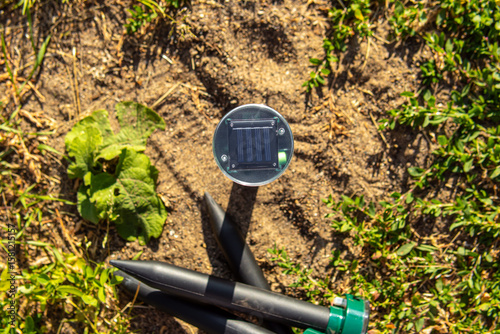 Solar-powered ultrasonic mole, mouse and snake repellents. Protection of the garden and garden beds from pests. Solar-powered battery top view