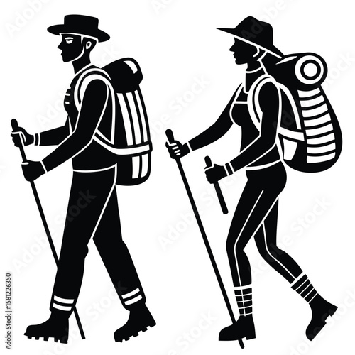 Man and woman hikers with backpacks and trekking poles silhouette