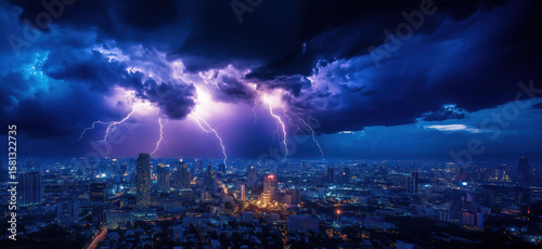 Fototapeta Naklejka Na Ścianę i Meble -  Dramatic lightning storm over city skyline at night with vibrant purple clouds.