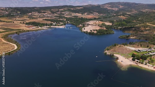 Aerial drone view of man made beaches at Albufeira do Azibo near Braganca, Portugal