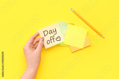 Woman with sticky notes and...