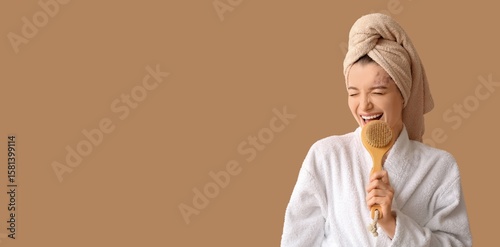 Beautiful woman in bathrobe...