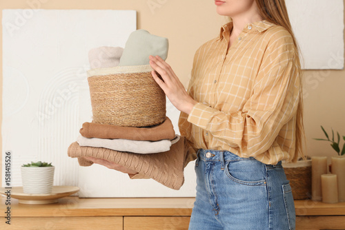 Woman organizing clean fold...