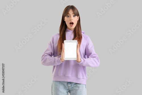 Shocked young woman with bl...