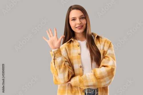 Beautiful happy young woman...