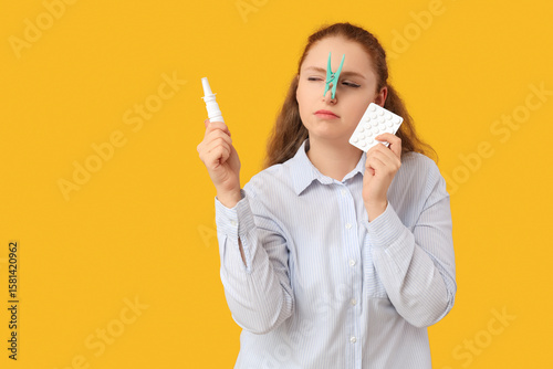 Ill young woman with clothe...