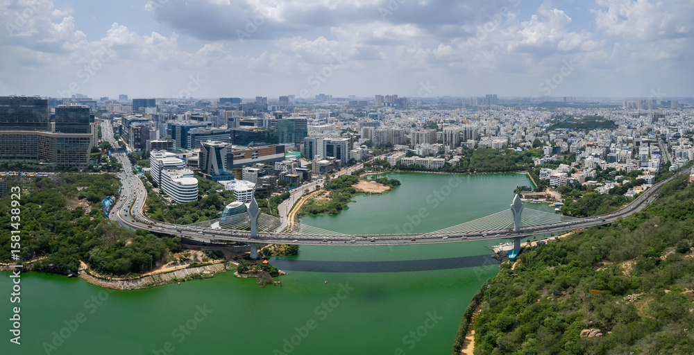 Naklejka premium Aerial panoramic view of Hitec city at Durgam Cheruvu lake In Hyderabad, INDIA
