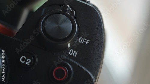 Close up of photo video camera in action