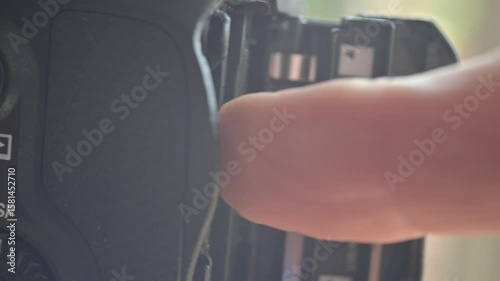 Close up of photo video camera in action