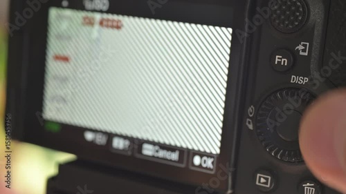 Close up of photo video camera in action