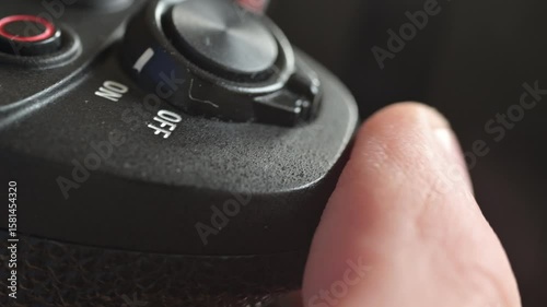 Close up of photo video camera in action