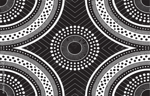 Intricate black and white geometric pattern design featuring circular and chevron elements