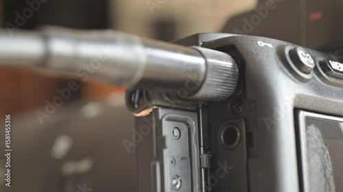 Close up of photo video camera in action
