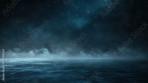 A dark, starry sky with a misty ocean in the foreground.