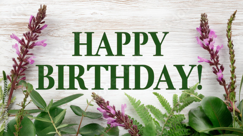 A beautiful arrangement of flowers in various colors and sizes, arranged to form the words 