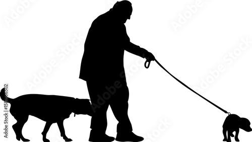 Silhouette of a man walking two dogs one on a long leash and one walking beside him in black and white