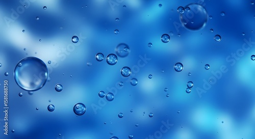 A blue background filled with various sized water droplets some with internal reflections