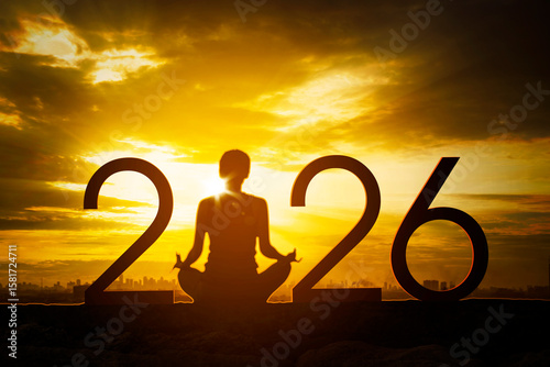 Woman Meditating for a Peaceful 2026 at Sunset