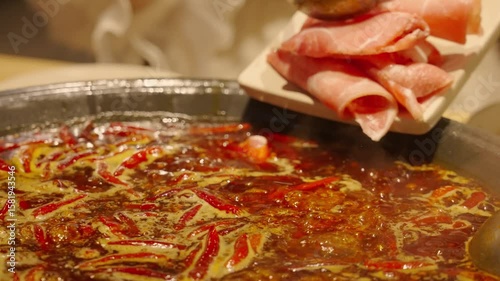 real shot of hotpot with spicy broth showcasing culinary culture