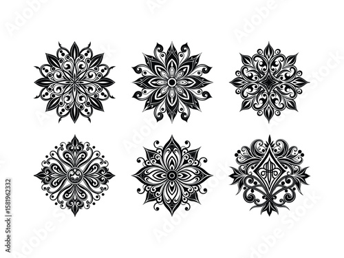 Intricate black floral ornaments with swirling patterns white
