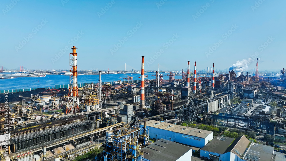 Obraz premium plant, aerial view, factory, petrochemical complex, steel mill, industry, drone, bird eye view, blue sky, environment, manufacturing, monodzukuri, japan, chimney, industrial area, technology, infrastr