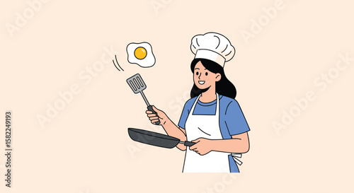 Young female chef happily preparing breakfast in a professional kitchen flipping a fried egg in a pan