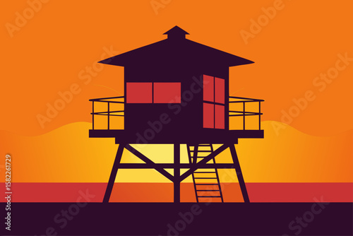 Old lifeguard tower at sunset with a blue sky over the beach and ocean