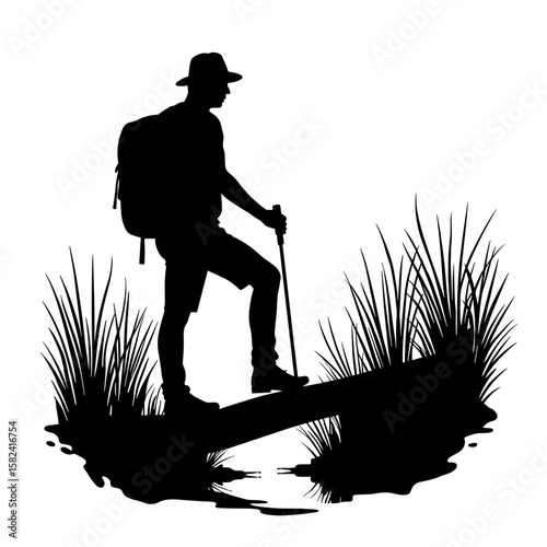 Hiker silhouette on boardwalk in marshland – Nature exploration copyspace