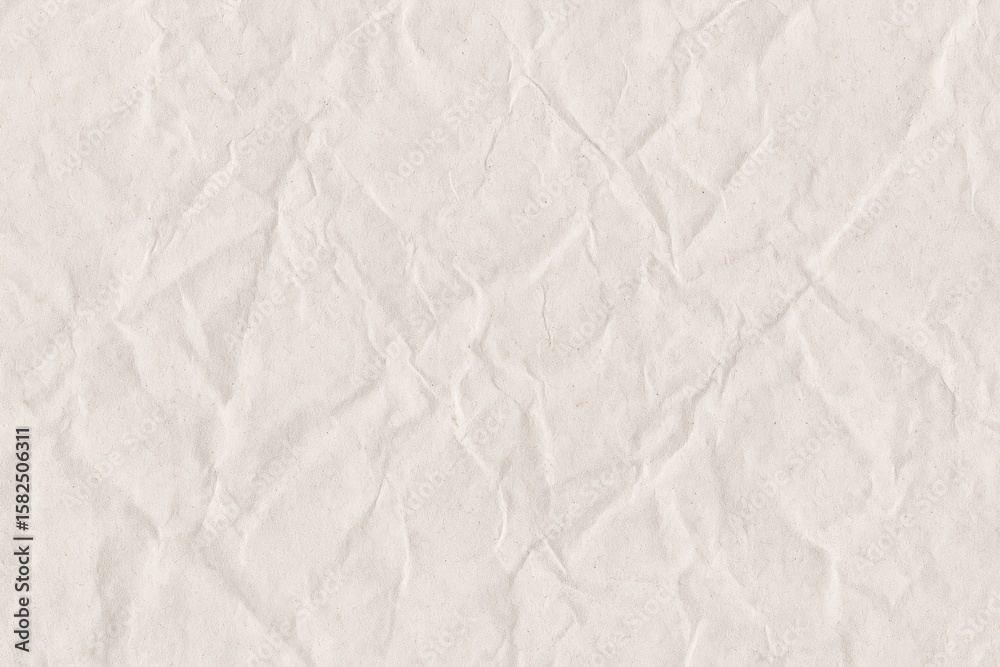 Obraz premium Background featuring white recycled craft paper with a textured, creased, and crumpled appearance and ample space for text on a hardboard surface.