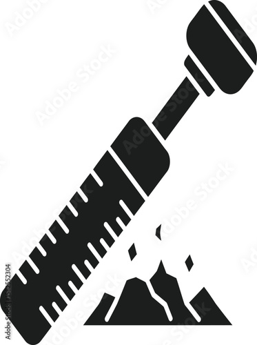 A black silhouette illustration of a dental tool impacting a pile of debris, possibly representing tooth decay or dental work.