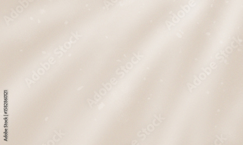 白い光が差すベージュ色の背景