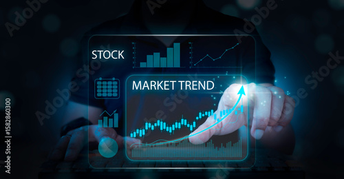 Investors trade on a virtual screen, with financial stock market statistics graphs on the screen, stock prices, and online trading data in the foreground. Growth graph, invest concept.