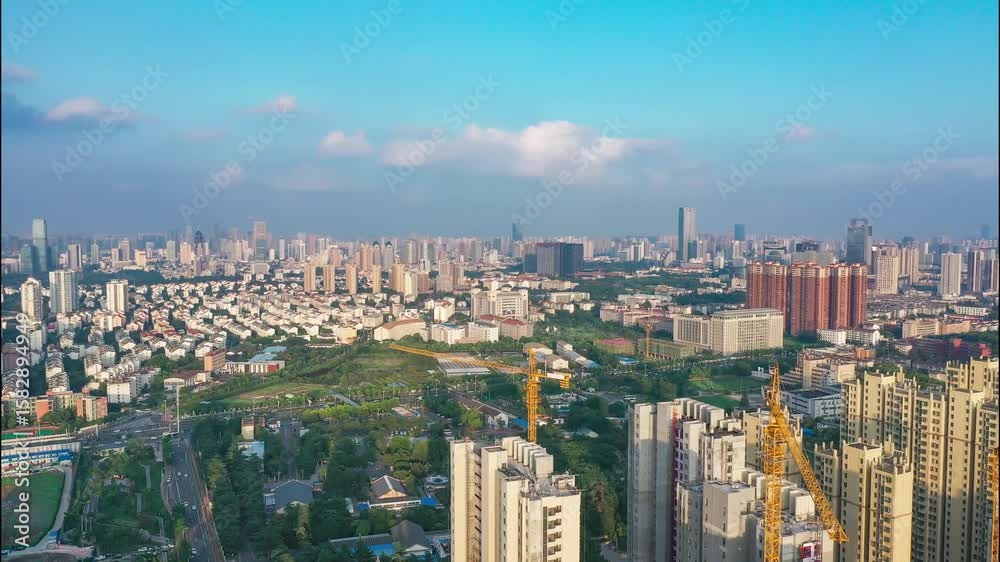 Dynamic aerial timelapse of urban construction in a rapidly growing city Dynamic aerial timelapse of urban construction in a rapidly growing city