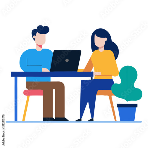 Two people collaborating at a desk with a laptop and a potted plant