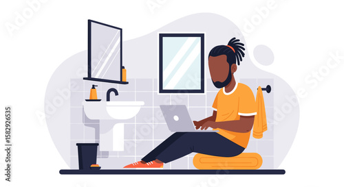 A young man works on his laptop in the bathroom, showcasing the flexibility of modern remote work and the potential for productivity anywhere, anytime.