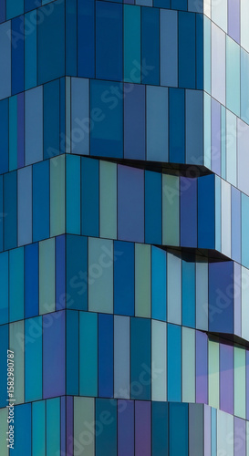 Dynamic Blue Glass Facade Pattern of Modern Building Architecture