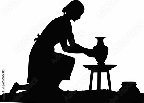 Silhouette of Potter Making Clay Pot on Wheel
