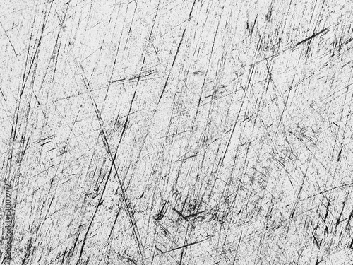 Textured surface with scratches and marks reveals the passage of time and use in an industrial setting