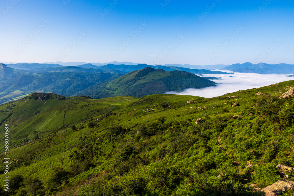 Naklejka premium Panorama of the La Rhune Mountain Range and a Sea of Clouds