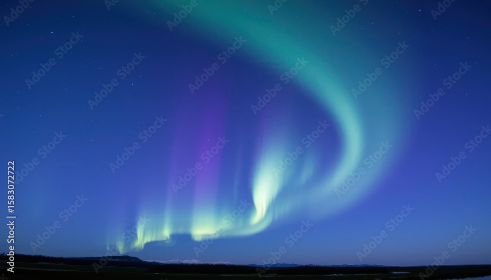 Naklejka premium Spectacular Aurora Borealis Displaying Vibrant Colors in the Night Sky