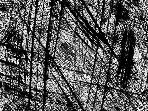 Abstract black and white textures formed by intricate lines and patterns in a dynamic design