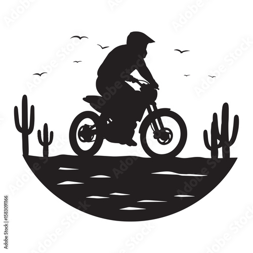 Silhouette of a motocross rider in a desert landscape featuring cacti and birds
